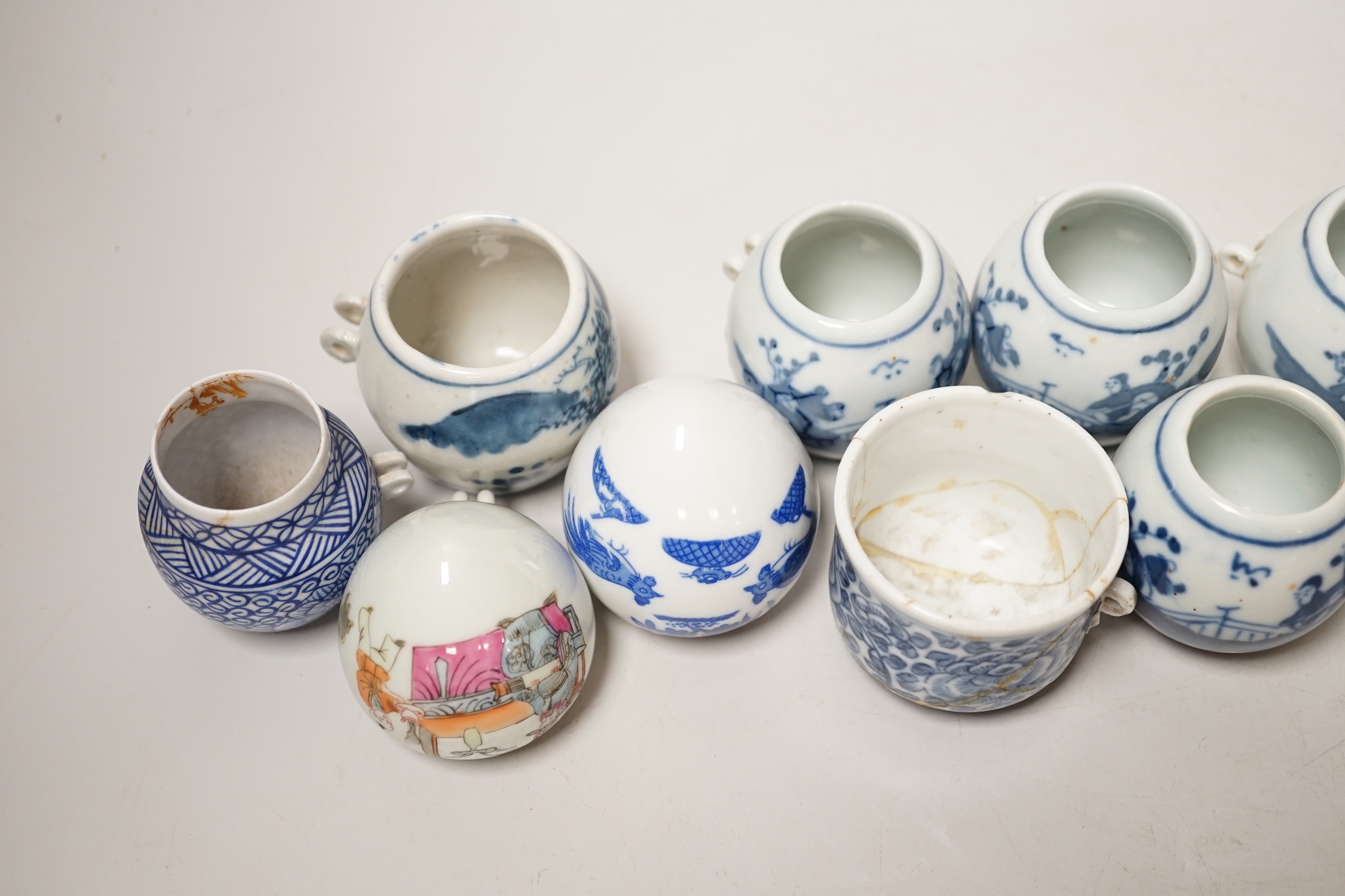 Ten Chinese porcelain bird feeders, 19th/20th century, 4.5cm